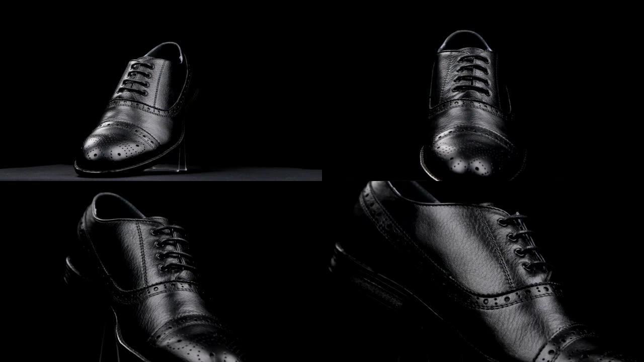黑色背景上黑色经典男鞋的旋转和近似。复制空间。