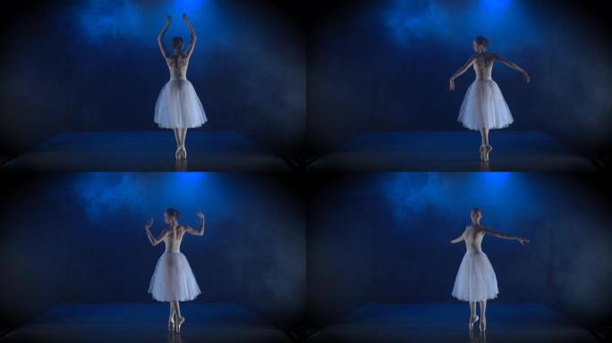 穿着白色短裙表演古典芭蕾舞剧的耀眼芭蕾舞演员。慢动作