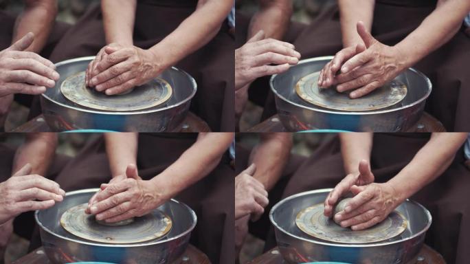 近距离的手在陶器中制作投手