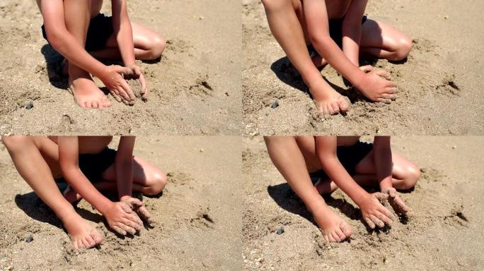 夏天，小可爱男孩坐在海边的沙滩上晒太阳。