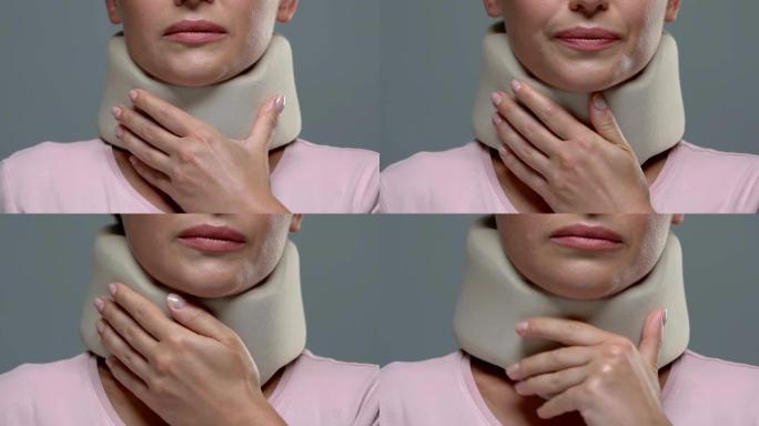 妇女触摸泡沫颈圈，创伤后矫形设备使用