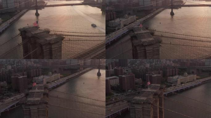 空中: 在布鲁克林大桥上近距离飞行，带有美国国旗和东河景，在美丽的4K曼哈顿纽约市天际线