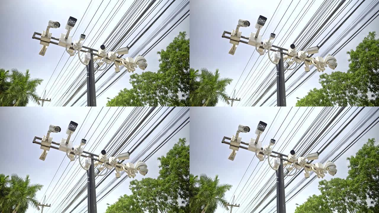 4k镜头，专栏上有许多闭路摄像机 (CCTV)。