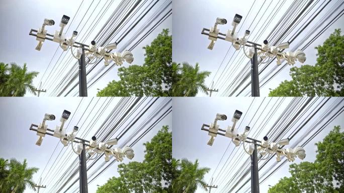 4k镜头，专栏上有许多闭路摄像机 (CCTV)。