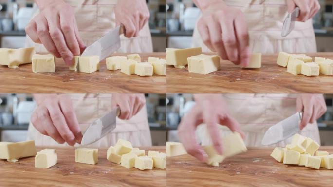 在厨房将黄油切成立方体