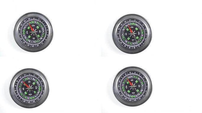 指南针在白色上旋转。顶视图