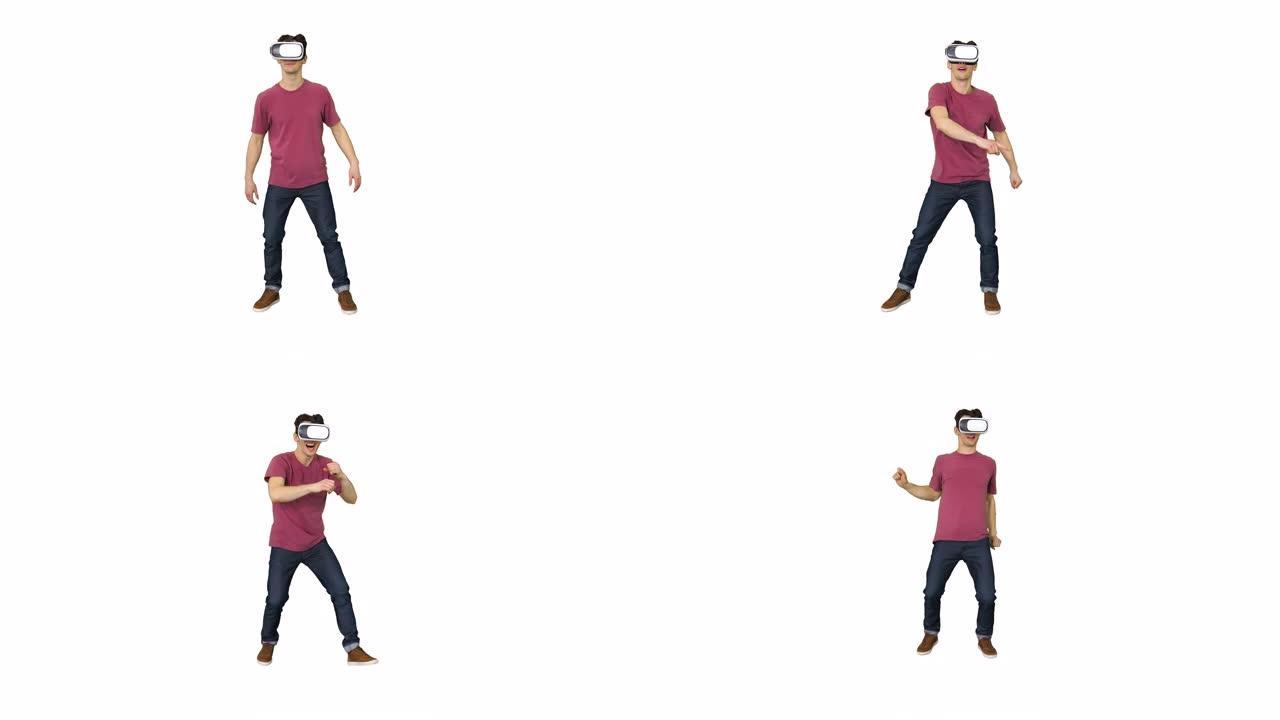 虚拟现实眼镜中的休闲男子跳舞玩视频游戏初学者水平白色背景
