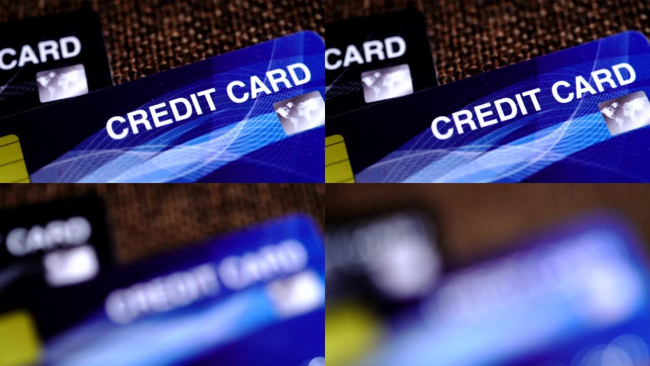 特写信用卡股票视频，电脑芯片，支付和金融安全概念。假信用卡制作股票和假身份证