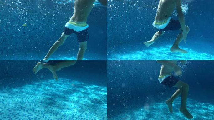 儿童腿在水下假装溺水
