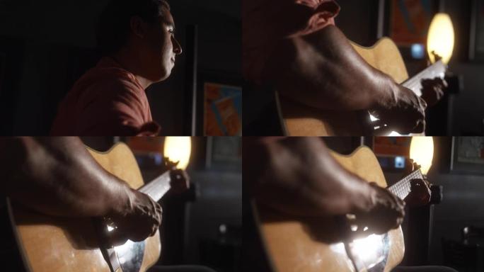 在昏暗的咖啡店里，一位拉丁裔男性音乐家的特写镜头在背后弹奏原声吉他，阳光照耀着pickguard