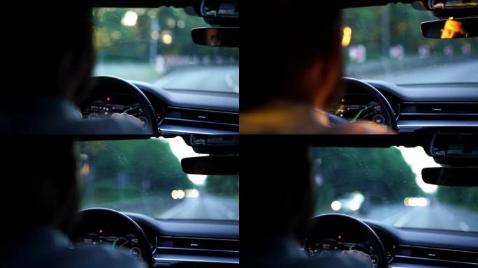 晚上在汽车转向过程中，男人的方向盘后座的特写镜头遵循驾驶规则关心安全