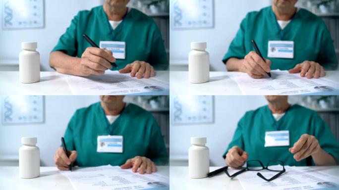 女性医生填写患者用药表，戴眼镜，药品