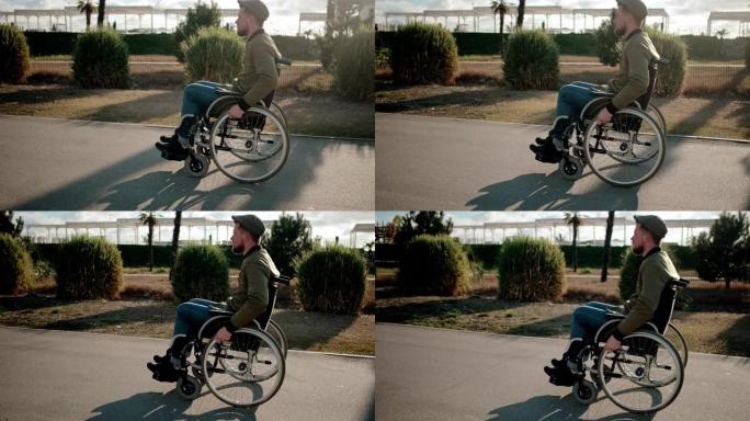 独立的男性残疾人正在坐在轮椅上过马路