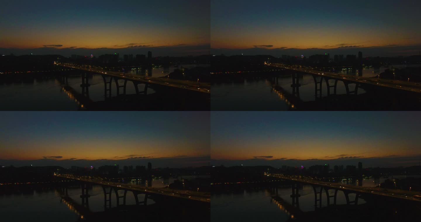 航拍夜晚泸州港的河上大桥