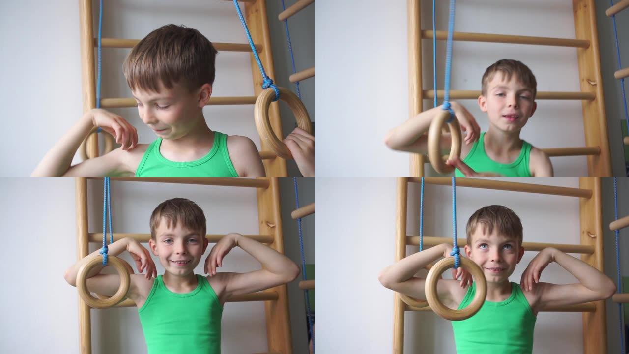 男孩在体操环附近显示二头肌