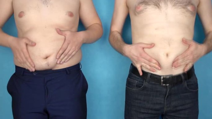 两个胖胖的肚子的男人摸肚子上的皱纹，不规则的生活方式，健康，慢动作，超重