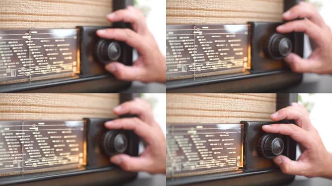 旧收音机前玻璃和调音手柄的特写