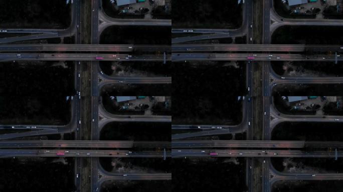 汽车在无人机视频右上角的高速公路上行驶。