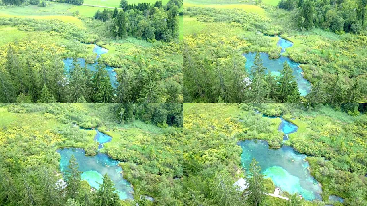 大自然中部的绿色和蓝色小湖