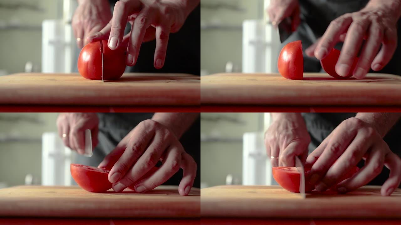 在切菜板上将番茄切成两半