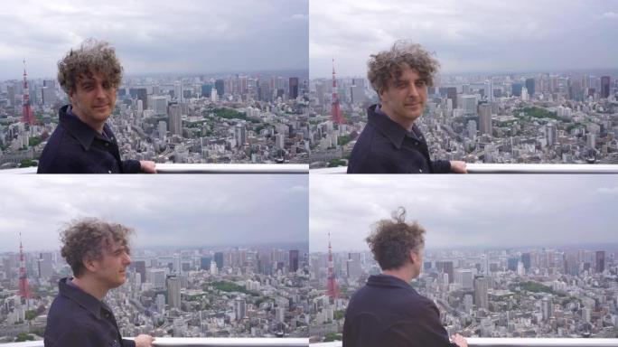 男子在日本东京旅行，并享有天际线景观