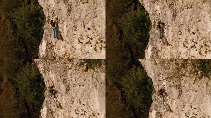 攀岩者沿着岩石攀登5类路线