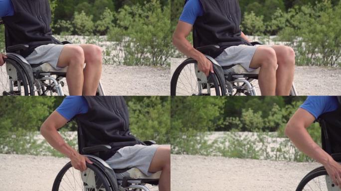 坐在轮椅上的残疾年轻学生男子的慢动作特写