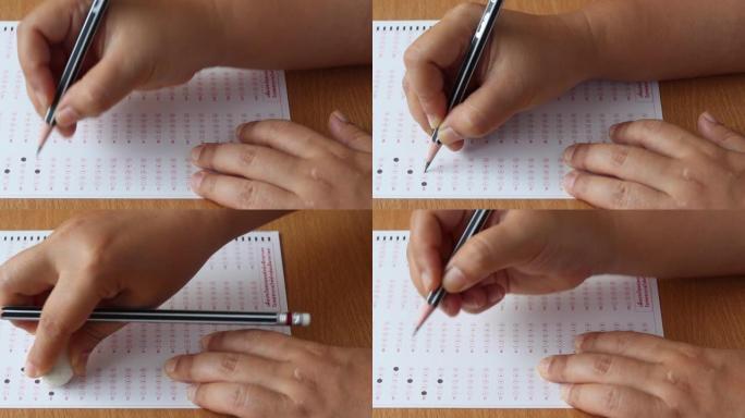 成熟学生的干手通过使用铅笔在标准化考试表格上选择多项选择，答案泡在木桌上。关于成人教育和终身学习的想