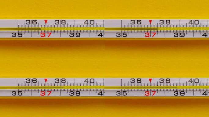 温度上升显示在温度计上的黄色背景特写