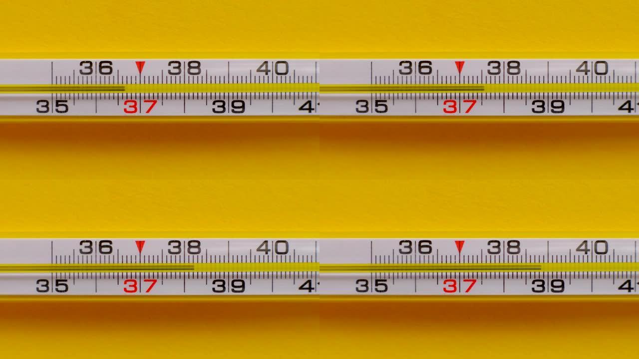 温度上升显示在温度计上的黄色背景特写
