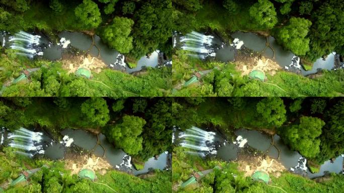 无人机通过瀑布进入河峡谷