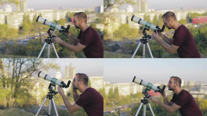 天文学家用望远镜看着城市周围的天空。