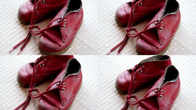 婴儿旧红鞋的特写镜头