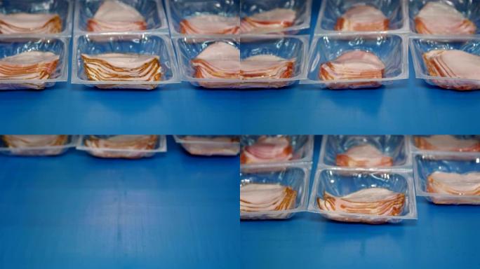 在肉类加工厂将猪肉火腿片包装在小盒子中