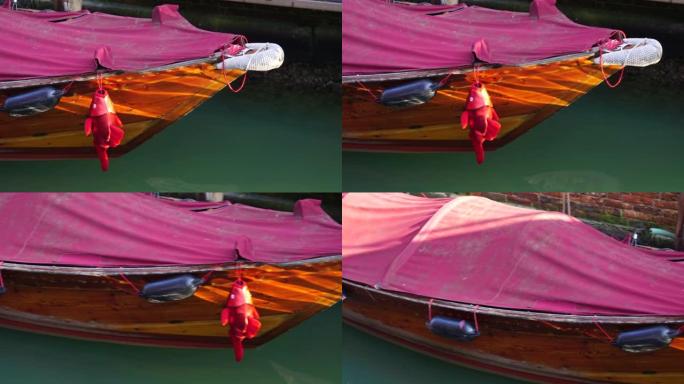 威尼斯意大利船系泊浮标鱼装饰日落太阳反射