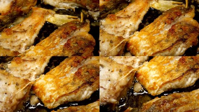 河鱼鲤鱼，切成块，用食用油在锅中油炸。
