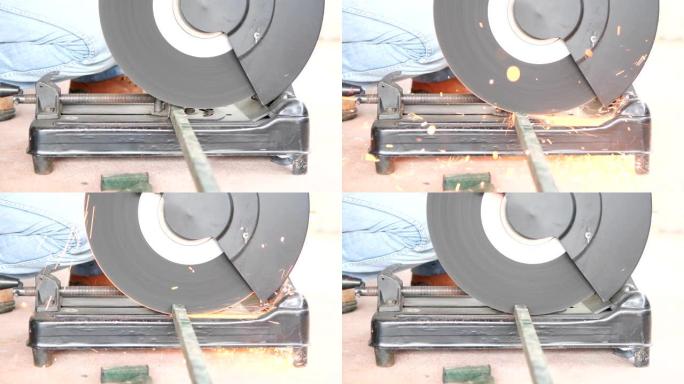 机械工程师用电动圆锯切割钢结构，4k慢动作镜头。
