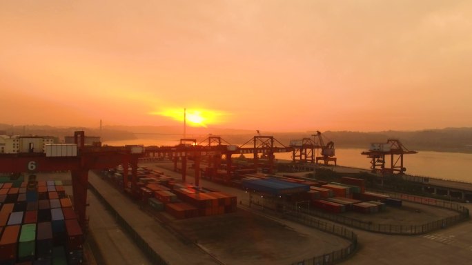 航拍货运港口早晨的朝霞