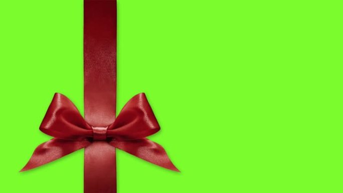 圣诞快乐礼品卡，丝带蝴蝶结改变颜色孤立在绿屏背景模板上，带复制空间