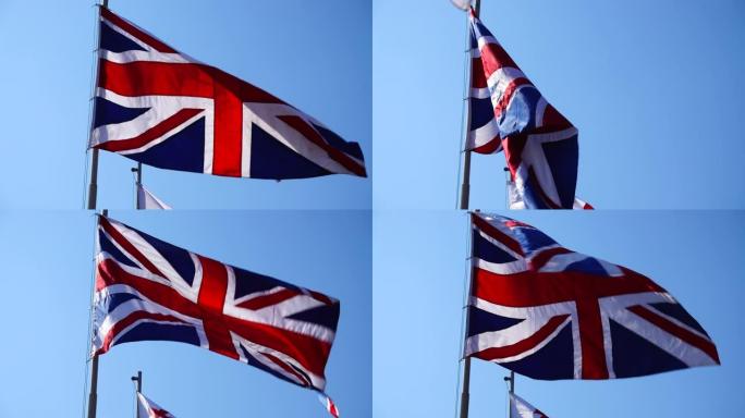 英国国旗在蓝天下。
