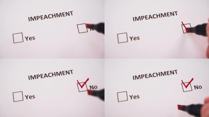 他的手用红色毡尖笔在问卷的白色页上的“弹劾”(IMPEACHMENT)一词下面的“否”(NO)一词上