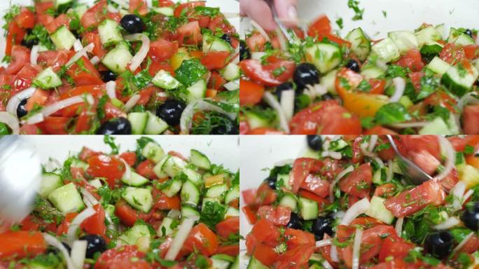 沙拉配红番茄、青黄瓜、洋葱和橄榄