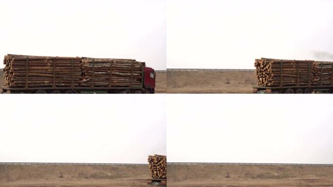 一辆大型货车运输木材，高速公路上的原木，复制空间，工业