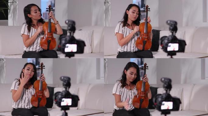 年轻的小提琴家在家里