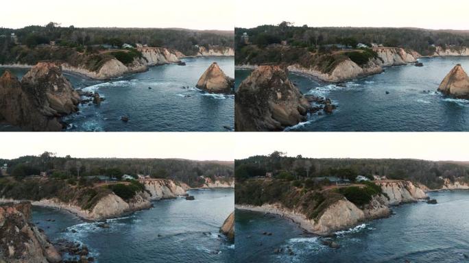 对北加州海岸线和悬崖边房屋的空中无人机拍摄