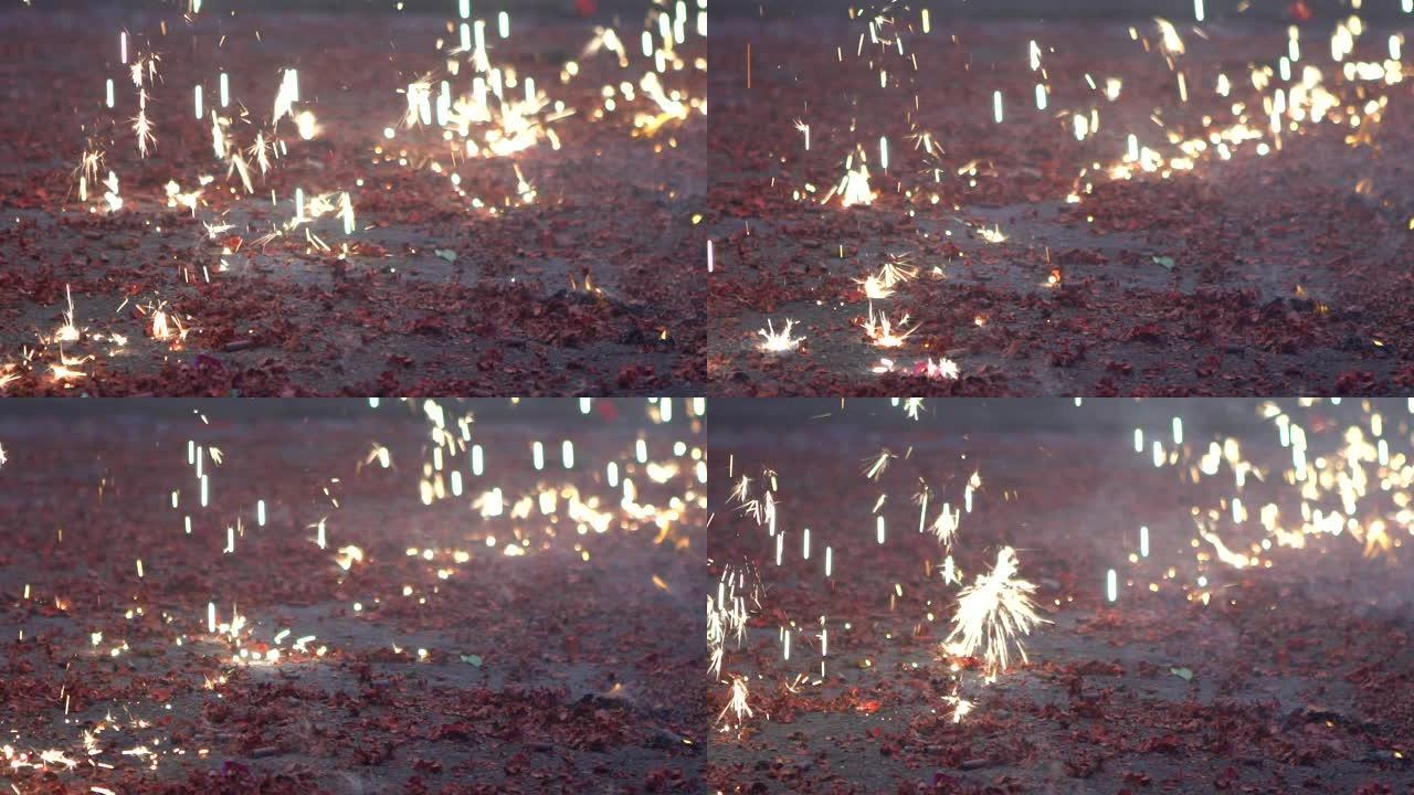 慢镜头:明亮的火雨在庆典上落下。烟花表演