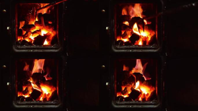 旧柴火炉放火烧木头和煤