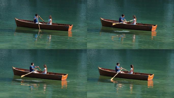 年轻夫妇在湖底的船上。