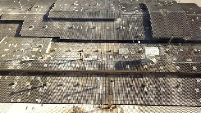 工厂屋顶、烟囱和排气的空中4k拍摄