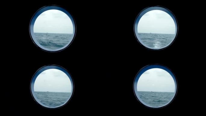 从船的舷窗可以看到海洋。从邮轮的舷窗可以看到海洋中的一艘船。